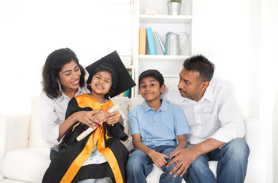 Happy indian family graduation, education concept photo