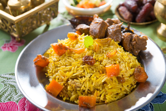 Arab rice, rice with meat and carrot in a bowl. Middle eastern f