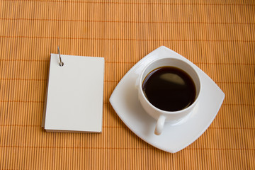 Obraz na płótnie Canvas Coffee and NotePad