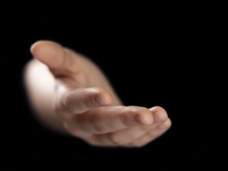 female elping hand from darkness
