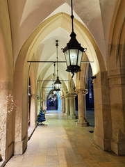 Fototapeta Gothic arcades Sukiennice by night, Krakow, Poland obraz