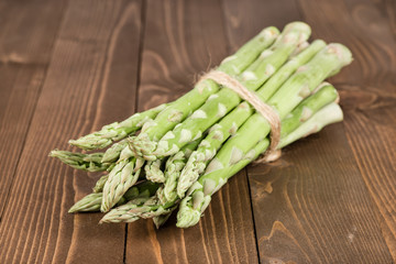 Asparagus on wood background