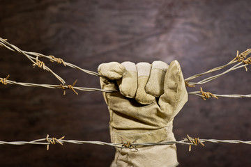 barbed wire with hand