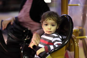 Family on carousel