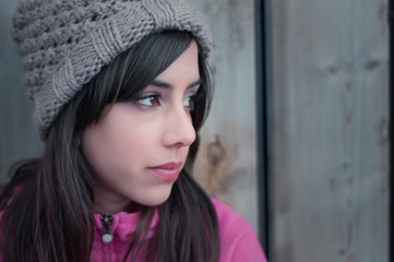 Portrait of a young woman's profile looking lonely