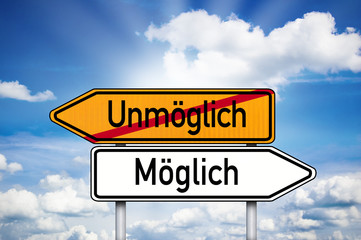 Wegweiser mit Unmöglich und Möglich