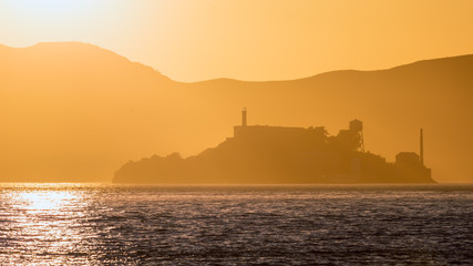 Alcatraz island penitentiary at sunset backlight in san Francisc