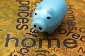 Piggy bank and home concept