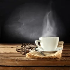 Foto auf Acrylglas Kaffee Bar warm cup of coffee and coffee grains