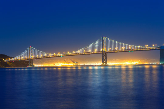 San Francisco Bay Bridge at sunset from Pier 7 California