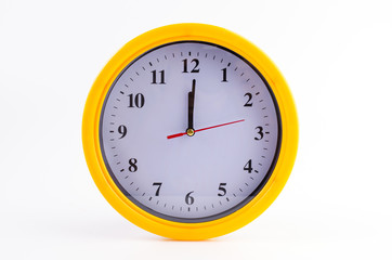 Yellow clock alarm isolated on white background