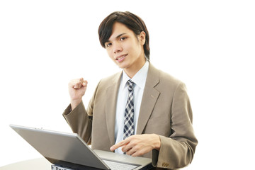 ガッツポーズのビジネスマン