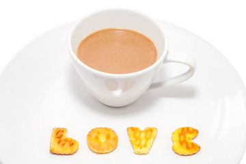 Coffee cup and cookie