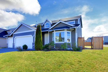 Obraz premium Blue classic house with tile roof
