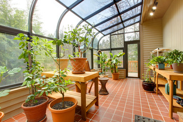 Fototapeta na wymiar Private home green house, sun room