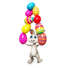happy bunny playing with colored eggs