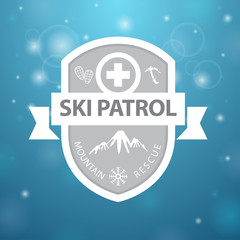 logotype mountain ski patrol rescue on blue background