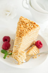 Slice of layered honey cake.