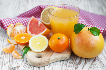 Citrus fruits and fresh orange juice