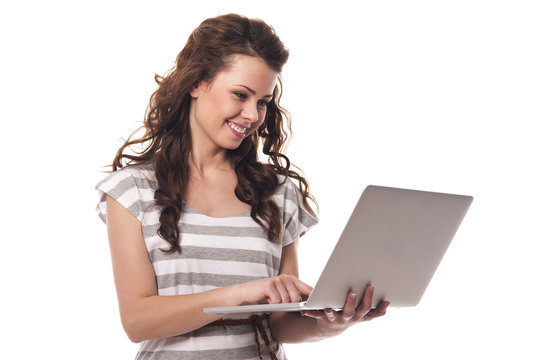 Smiling woman with contemporary laptop