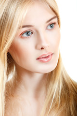Fototapeta premium young beautiful woman portrait with long blond hair over white