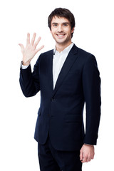 Young businessman isolated on white