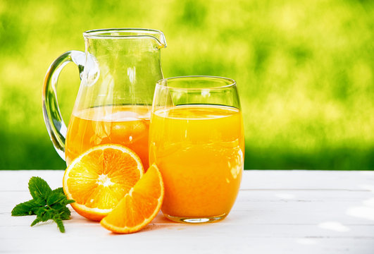 A Jug And Glass Of Fresh Orange Juice