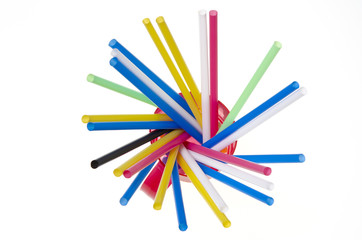 color cocktail stick in a red cup