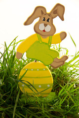 Easter bunny with painted Easter eggs.