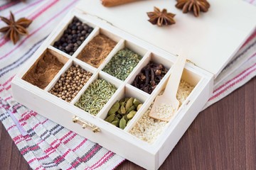 Assortment collection of spices and herb in wooden box, food