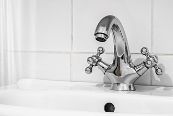 Water tap closed in the bathroom