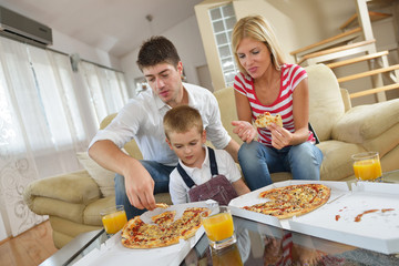 family eating pizza