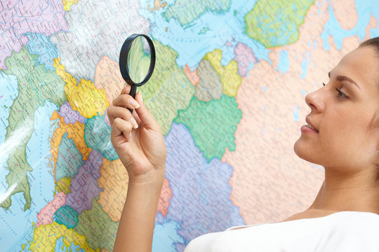 Woman Looking At World Map