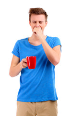 Portrait of handsome young man with cup, isolated on white