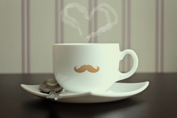 Moustache cup with steam in heart shape