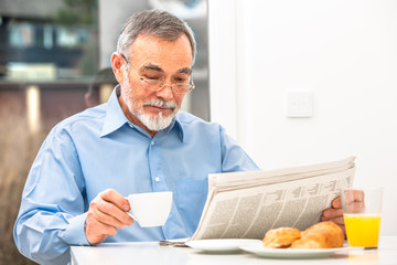 Senior man with a newspaper