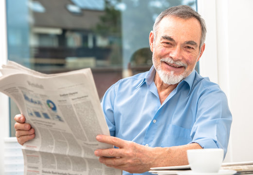Senior man with a newspaper