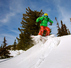 Snowboarder jumping