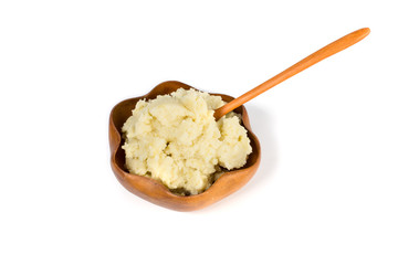 Mashed potatoes on wooden bow