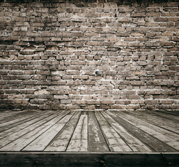 old room with brick wall