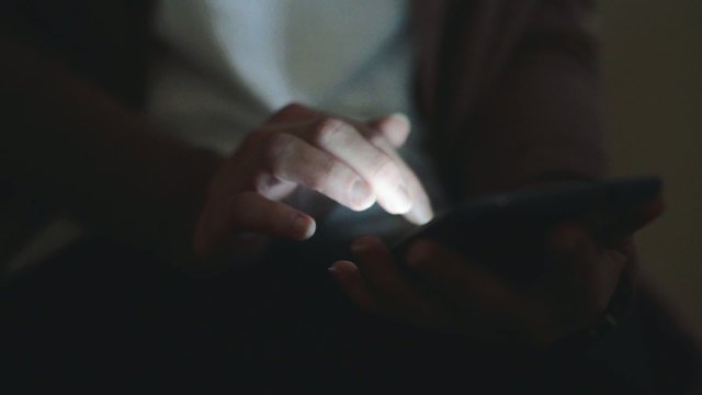 close up of hands woman using typing on smart phone cellphone 