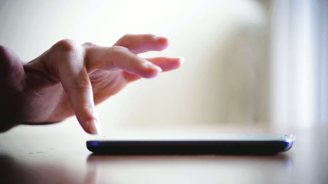 close up of hands woman using typing on smart phone cellphone 