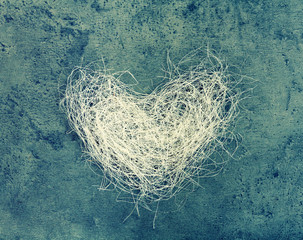 Heart of loofah on concrete background