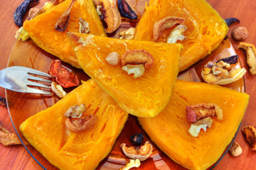 Baked pumpkin with dried fruits and nuts