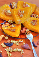 Baked pumpkin with dried fruits and nuts