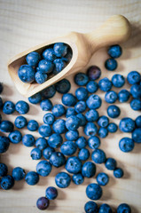 Fresh blueberries on wooden background