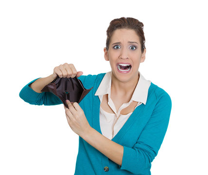 Shocked woman showing empty wallet
