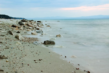 Fototapeta na wymiar Tranquility seashore landscape with stones