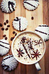 Cup of aromatic coffee and coffee beanes/coffee background