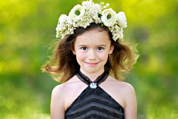 portrait of little girl outdoors in summer © zagorodnaya